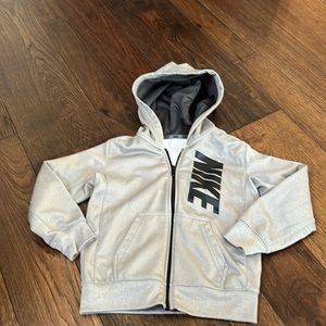 Nike hooded sweat jacket. dry fit. size 4/5